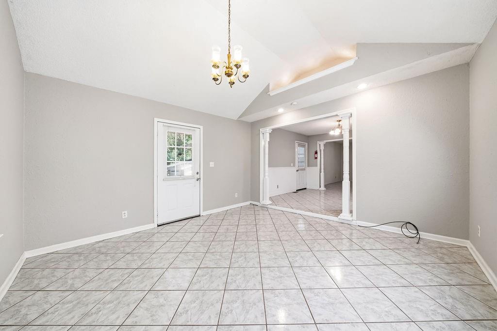 116 Monterey Drive Dalton, GA 30721 - Photo 24 of 39 a view of an empty room and chandelier fan