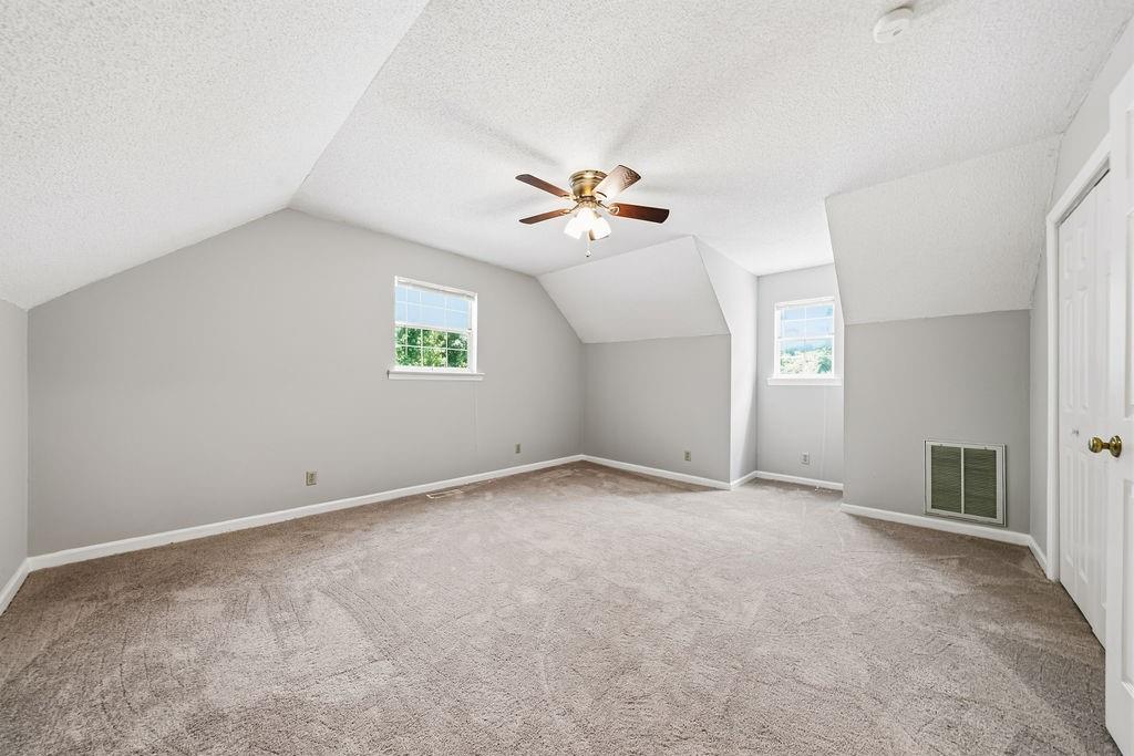 116 Monterey Drive Dalton, GA 30721 - Photo 30 of 39 a view of an empty room with a window