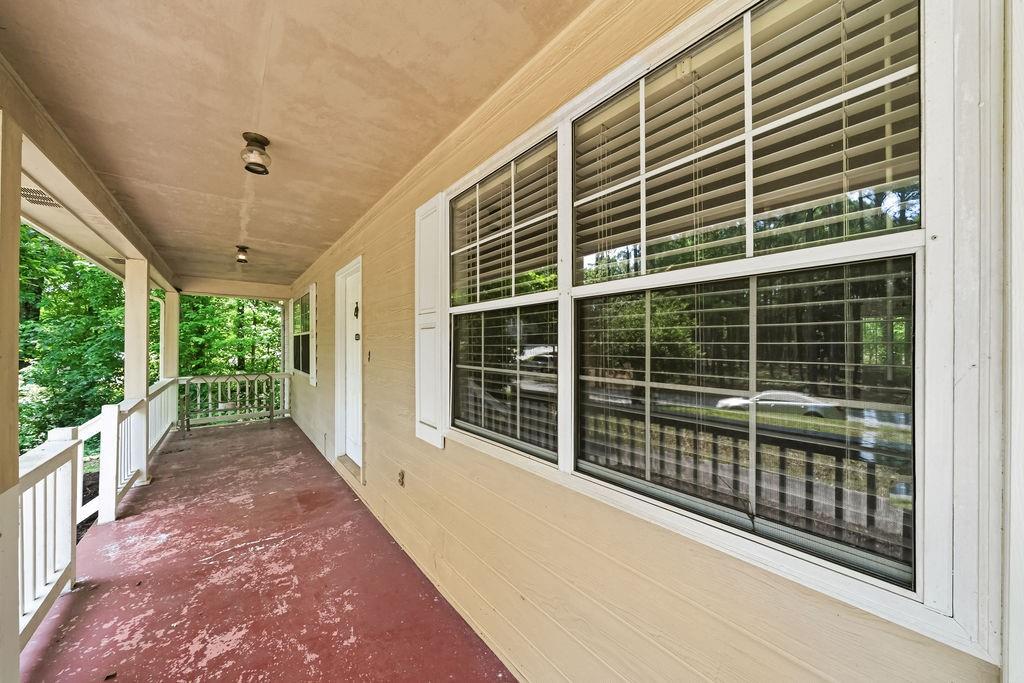 116 Monterey Drive Dalton, GA 30721 - Photo 3 of 39 a view of balcony with floor to ceiling windows and yard