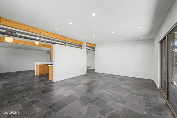 a kitchen with stainless steel appliances granite countertop a stove and a sink