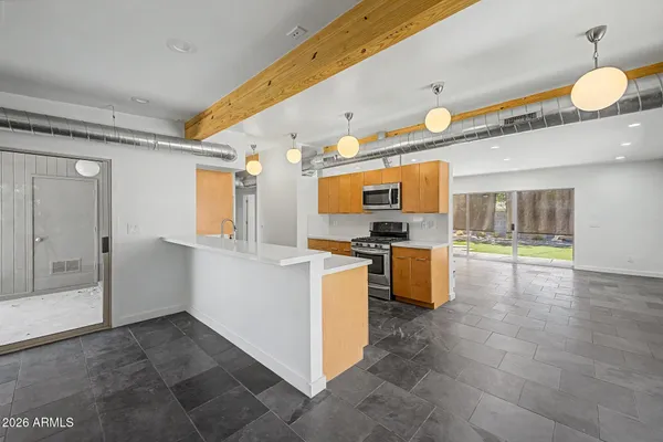 a bathroom with a sink a toilet and vanity