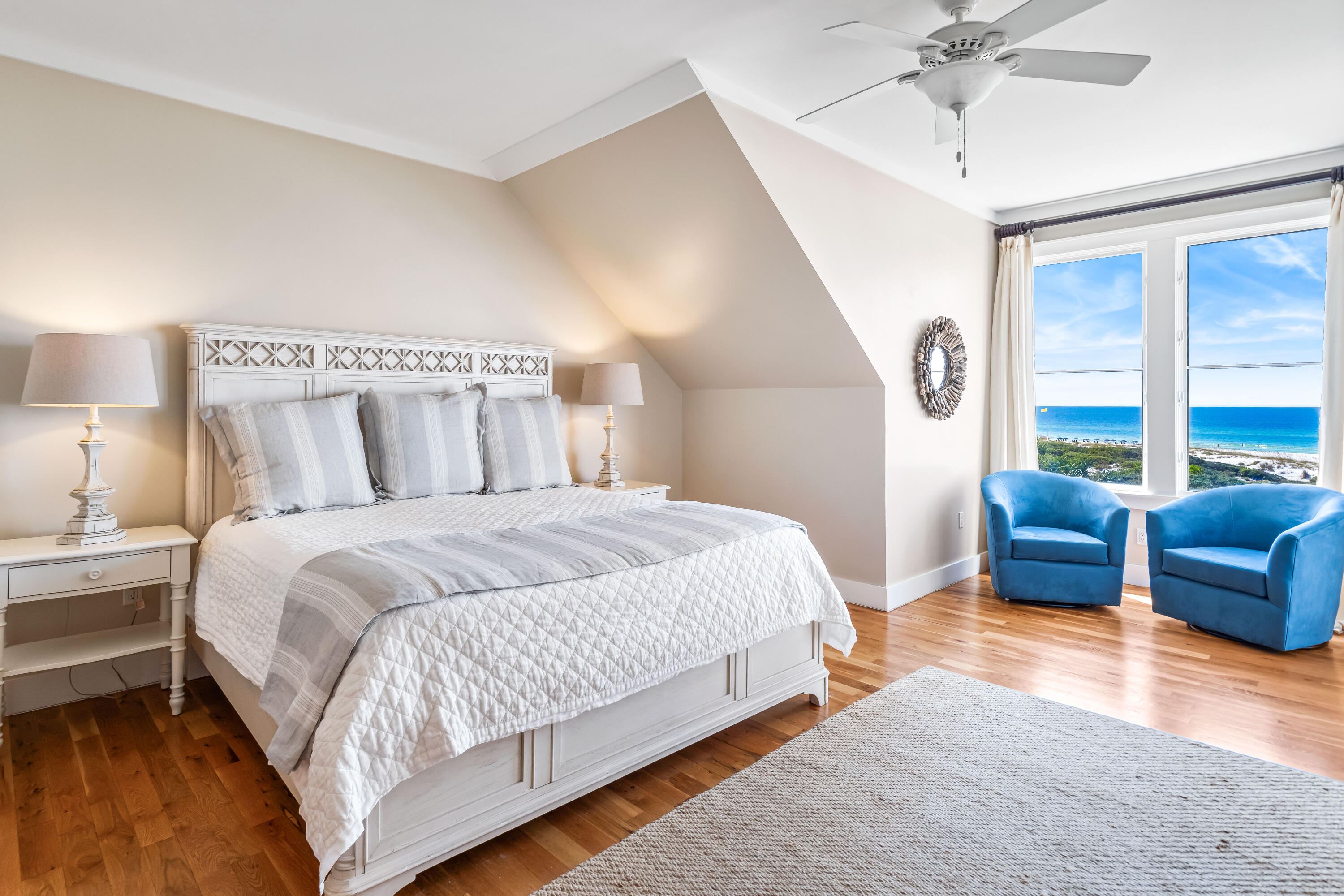 337 Bridge Lane, Unit 421B Watersound, FL 32461 - Photo 25 of 55 a bedroom with a bed and a couch