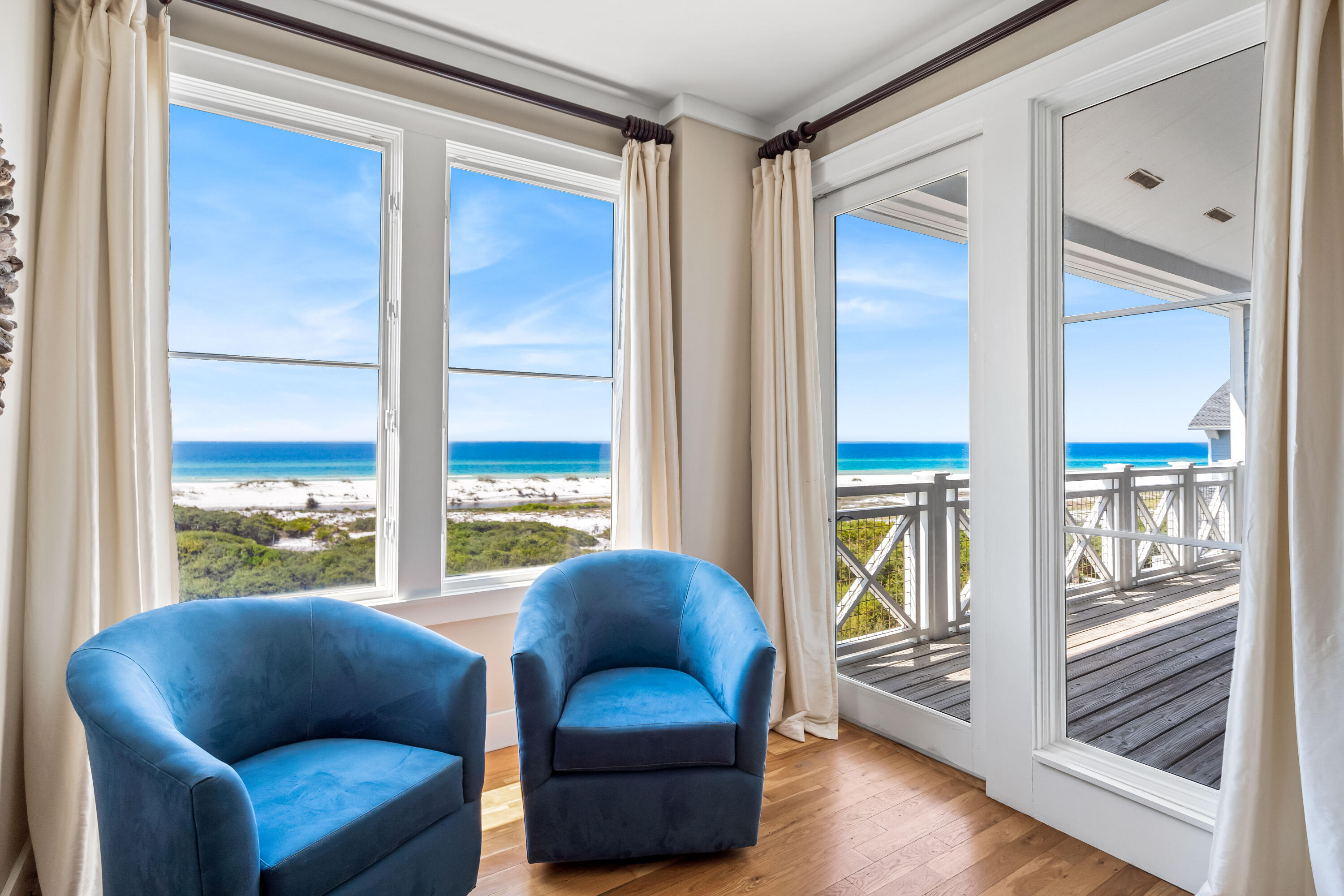 337 Bridge Lane, Unit 421B Watersound, FL 32461 - Photo 26 of 55 a living room with furniture and a large window