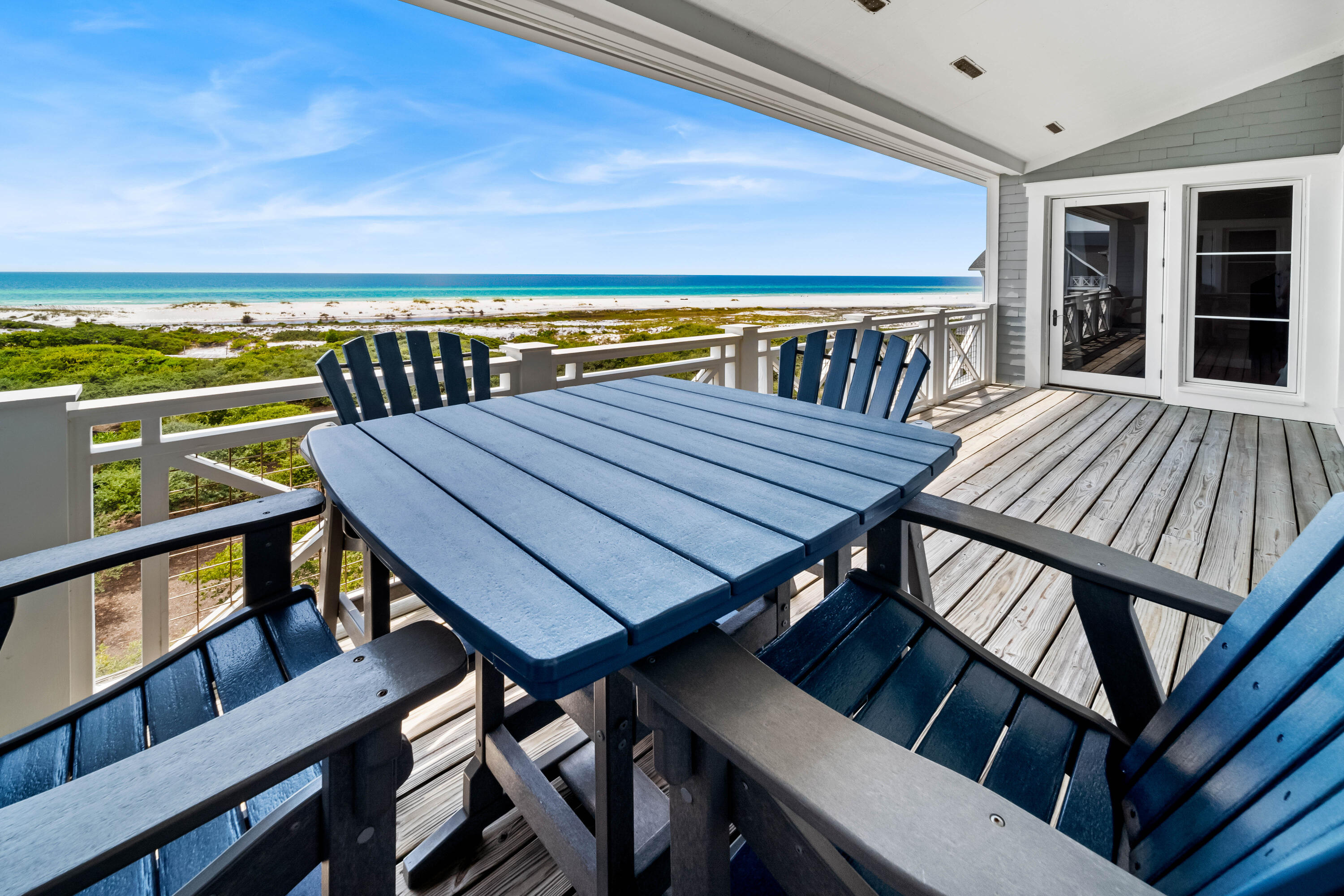 337 Bridge Lane, Unit 421B Watersound, FL 32461 - Photo 46 of 55 a view of a balcony with table and chairs