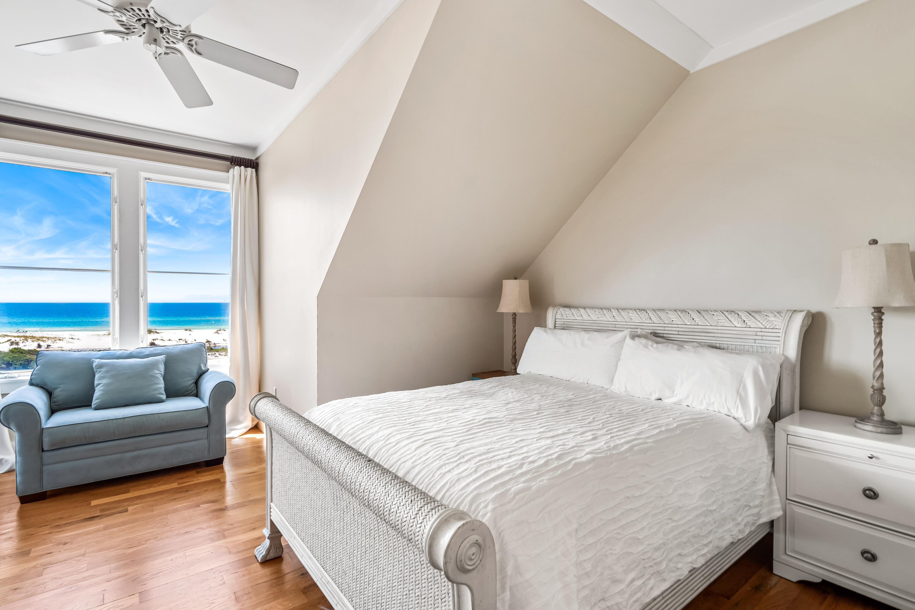 337 Bridge Lane, Unit 421B Watersound, FL 32461 - Photo 47 of 55 a bedroom with a bed and a couch