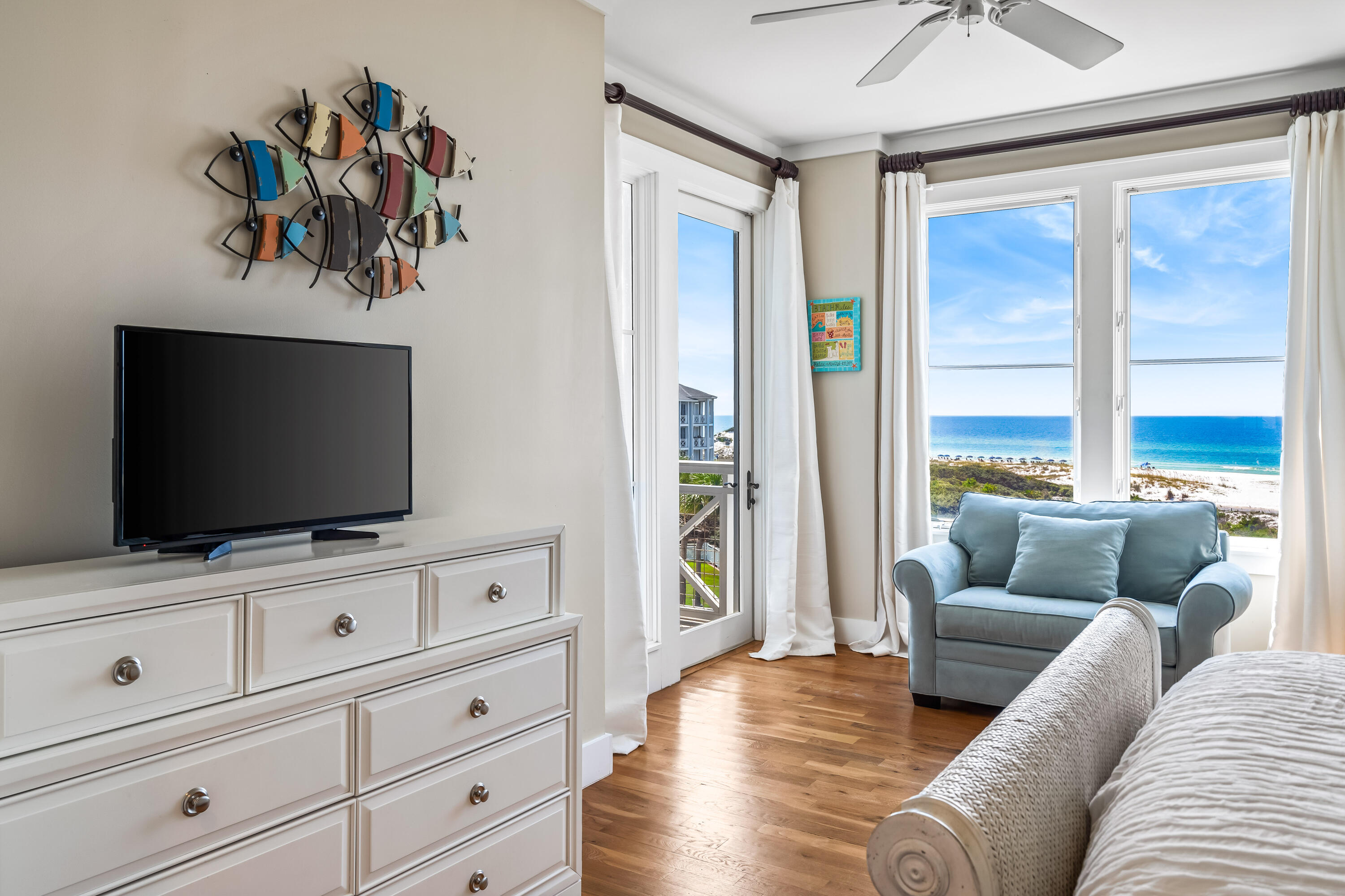 337 Bridge Lane, Unit 421B Watersound, FL 32461 - Photo 48 of 55 a living room with furniture and a flat screen tv