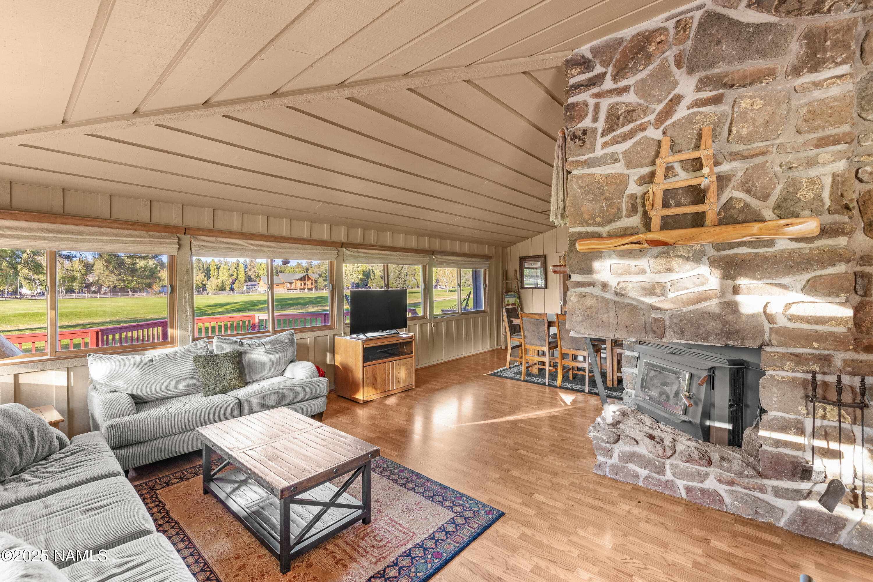 420 East Navajo Road Munds Park, AZ 86017 - Photo 24 of 55 Natural stone around the wood stove