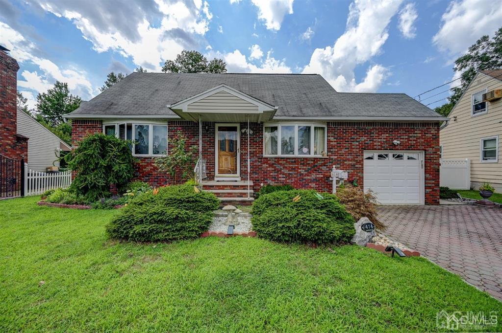 414 Inwood Road Linden, NJ 07036 - Photo 1 of 33 a front view of a house with garden