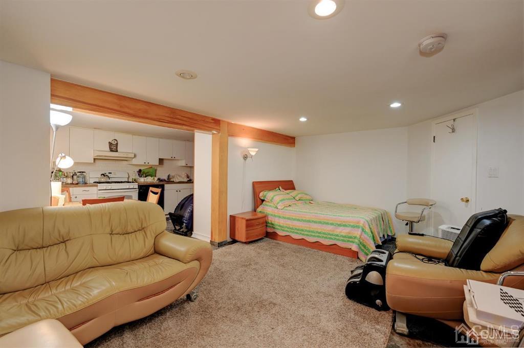414 Inwood Road Linden, NJ 07036 - Photo 15 of 33 a living room with furniture and a view of bedroom