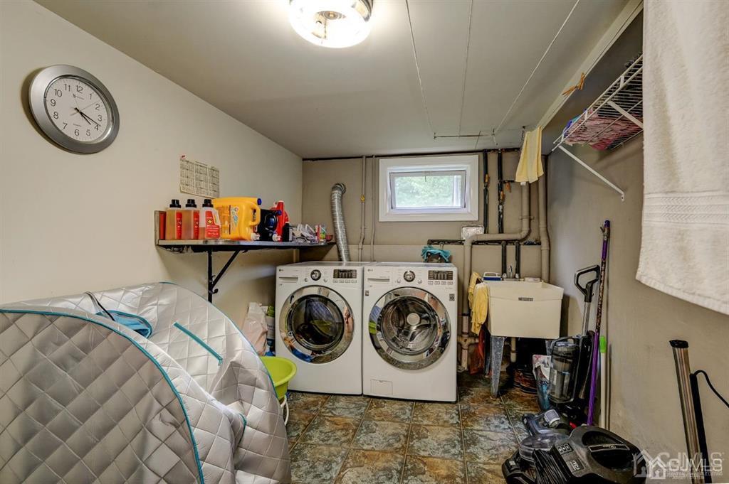 414 Inwood Road Linden, NJ 07036 - Photo 24 of 33 a utility room with dryer and washer