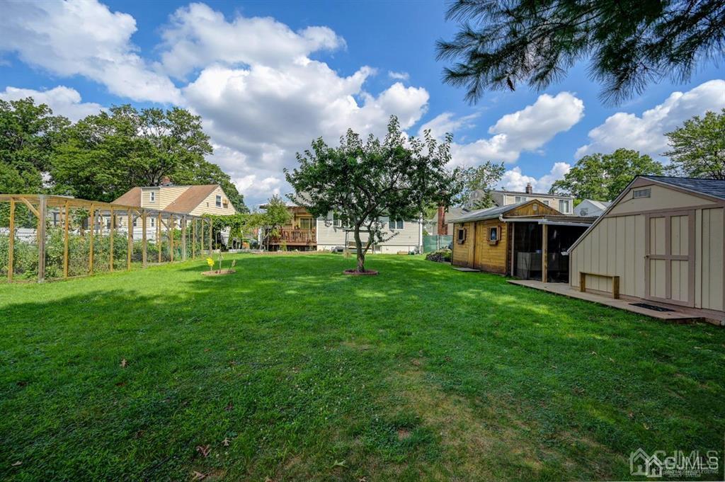 414 Inwood Road Linden, NJ 07036 - Photo 30 of 33 a view of an house with backyard space and balcony