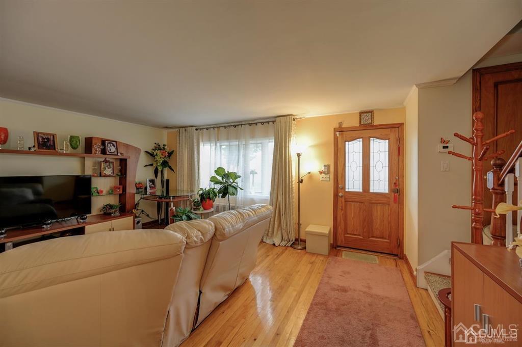 414 Inwood Road Linden, NJ 07036 - Photo 3 of 33 a view of a livingroom with furniture and a flat screen tv