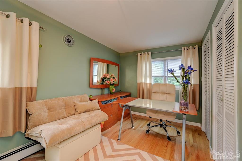 414 Inwood Road Linden, NJ 07036 - Photo 10 of 33 a living room with furniture and a flat screen tv