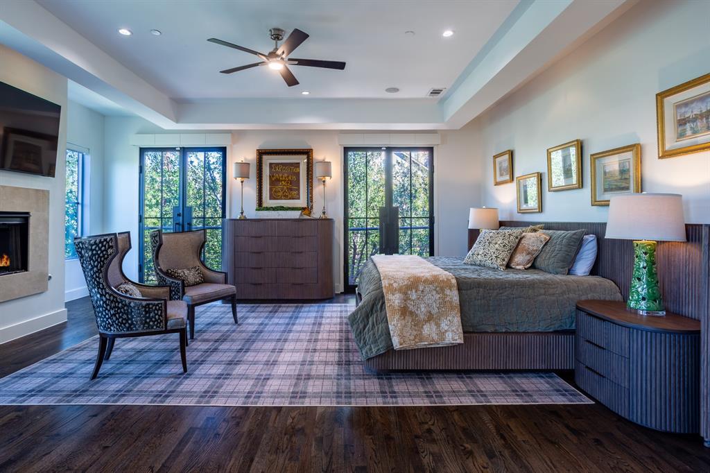 2630 Welborn Street Dallas, TX 75219 - Photo 25 of 40 a living room with furniture and a fireplace