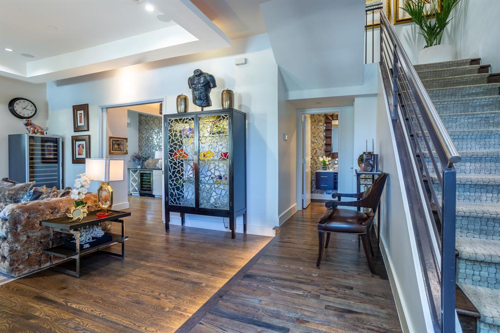 2630 Welborn Street Dallas, TX 75219 - Photo 6 of 40 a view of a livingroom with furniture and staircase