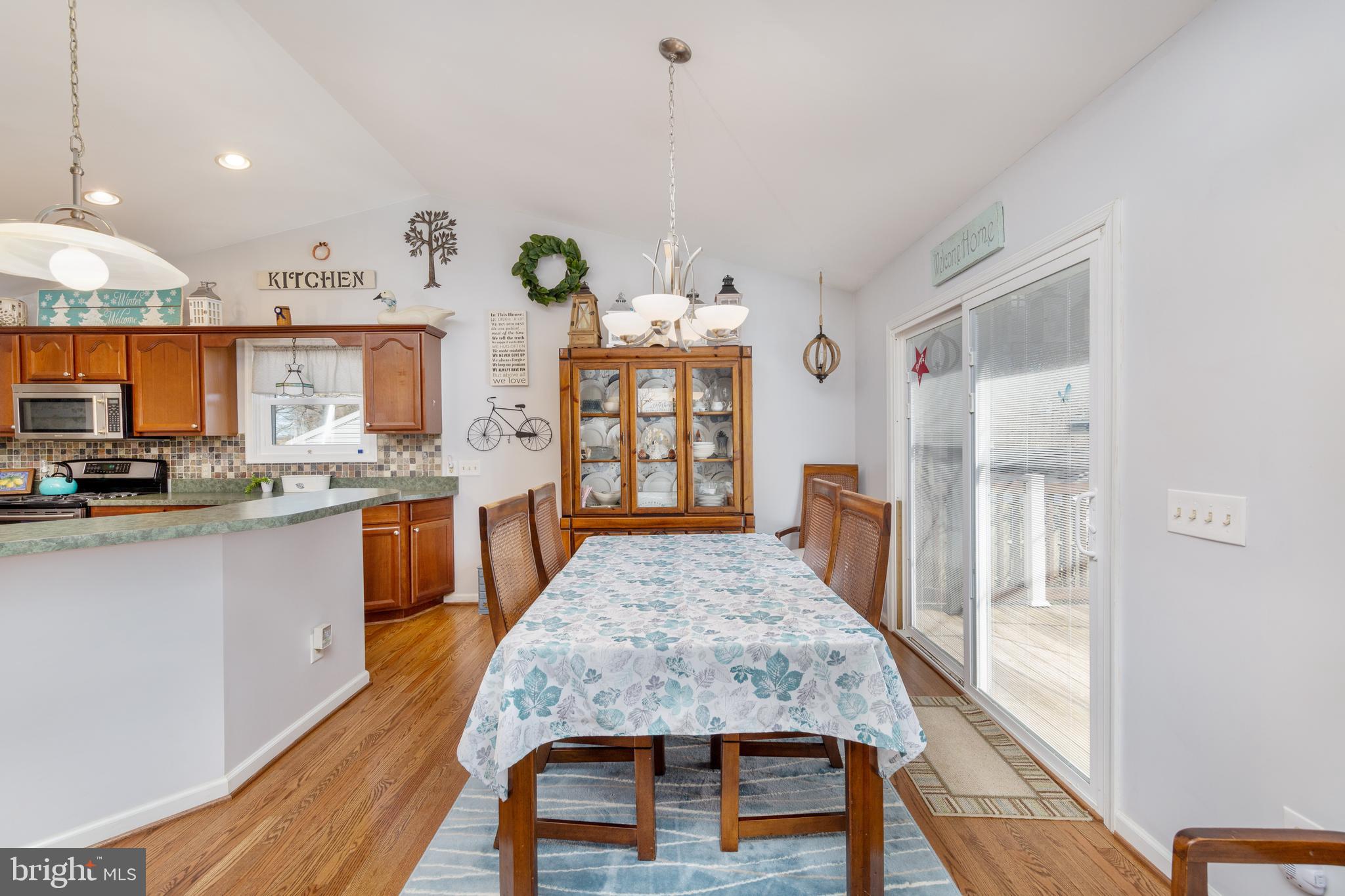 198 Clubhouse Road Delta, PA 17314 - Photo 17 of 37 DINING ROOM WITH NEW SLIDER TO REAR DECK !!