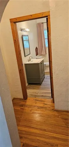 a bathroom with a sink and mirror