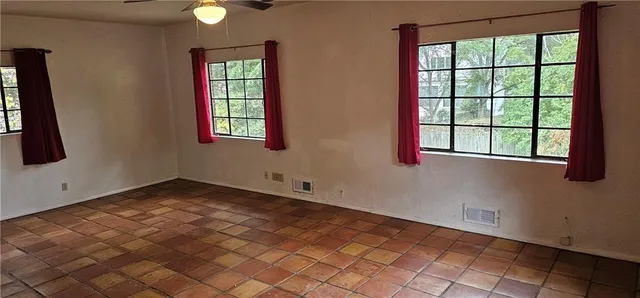 an empty room with windows