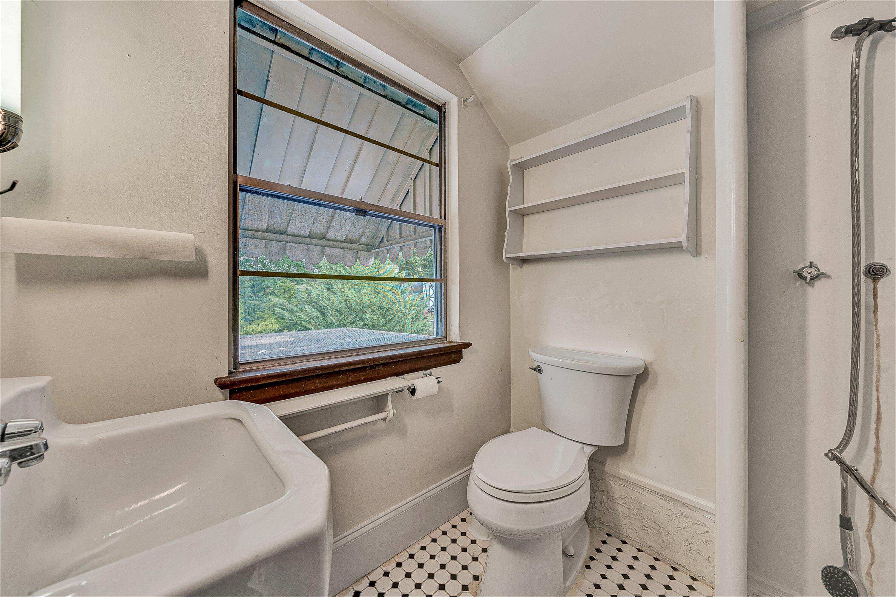 1917 Langdon Road Southwest Roanoke, VA 24015 - Photo 27 of 42 a bathroom with a toilet a sink and a bathtub
