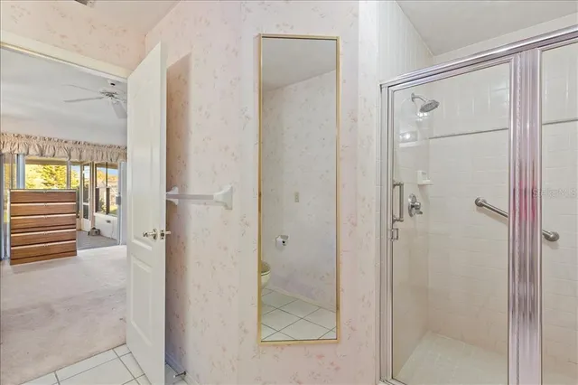 a living room with patio furniture and a window