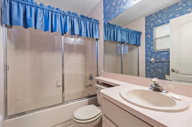 a living room with furniture or couch and a fireplace