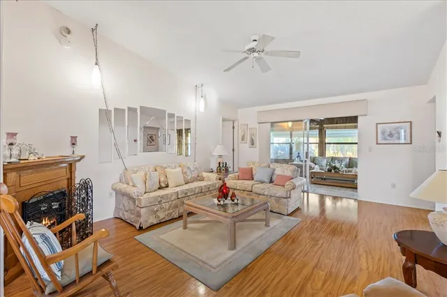 a view of an entryway with wooden floor and door