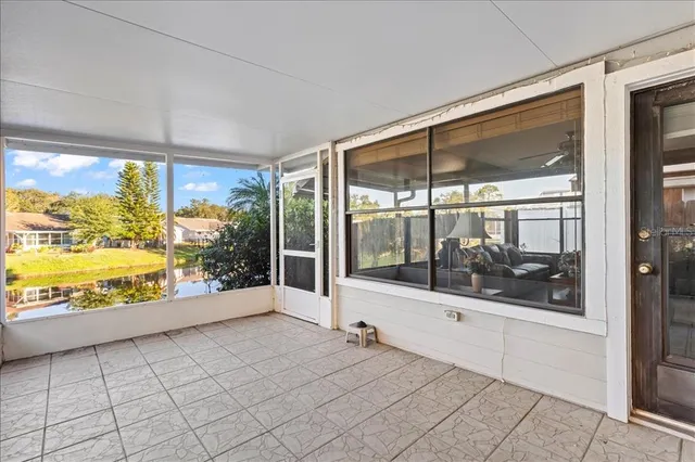 an aerial view of house with yard