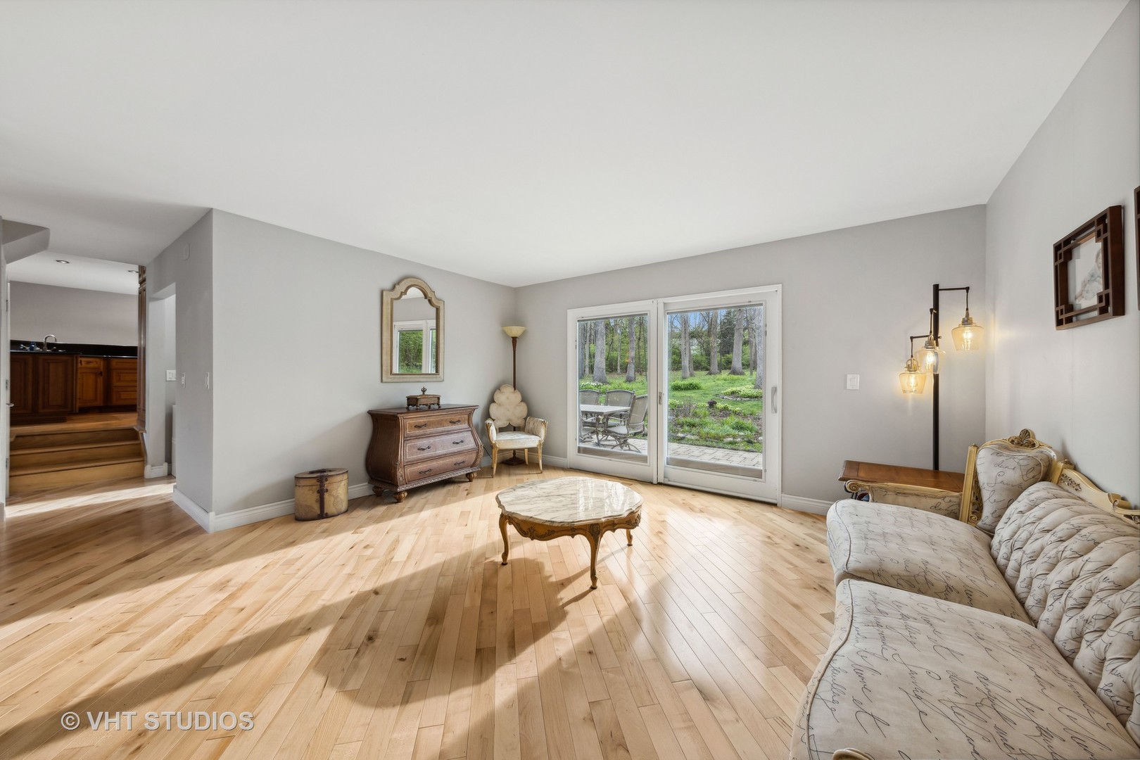 8521 Una Avenue Naperville, IL 60565 - Photo 15 of 41 a living room with furniture and a large window