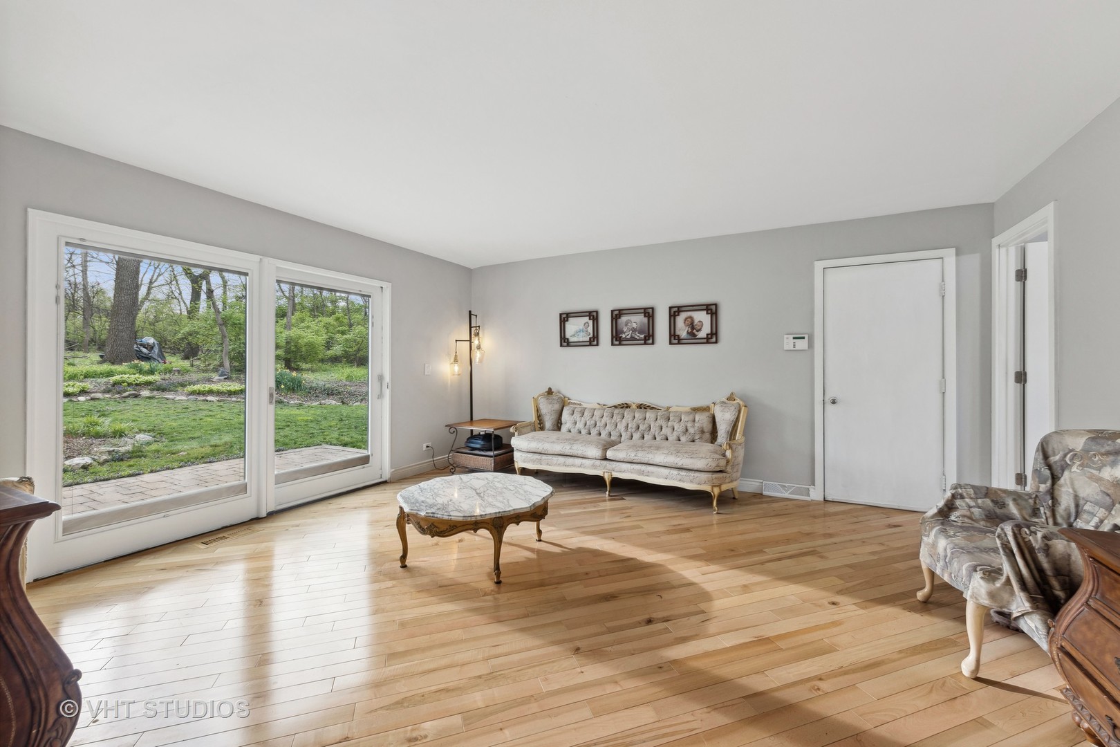 8521 Una Avenue Naperville, IL 60565 - Photo 16 of 41 a living room with furniture and a large window