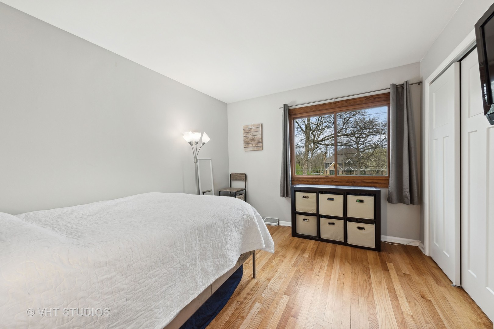 8521 Una Avenue Naperville, IL 60565 - Photo 23 of 41 a bed room with a bed and a large window
