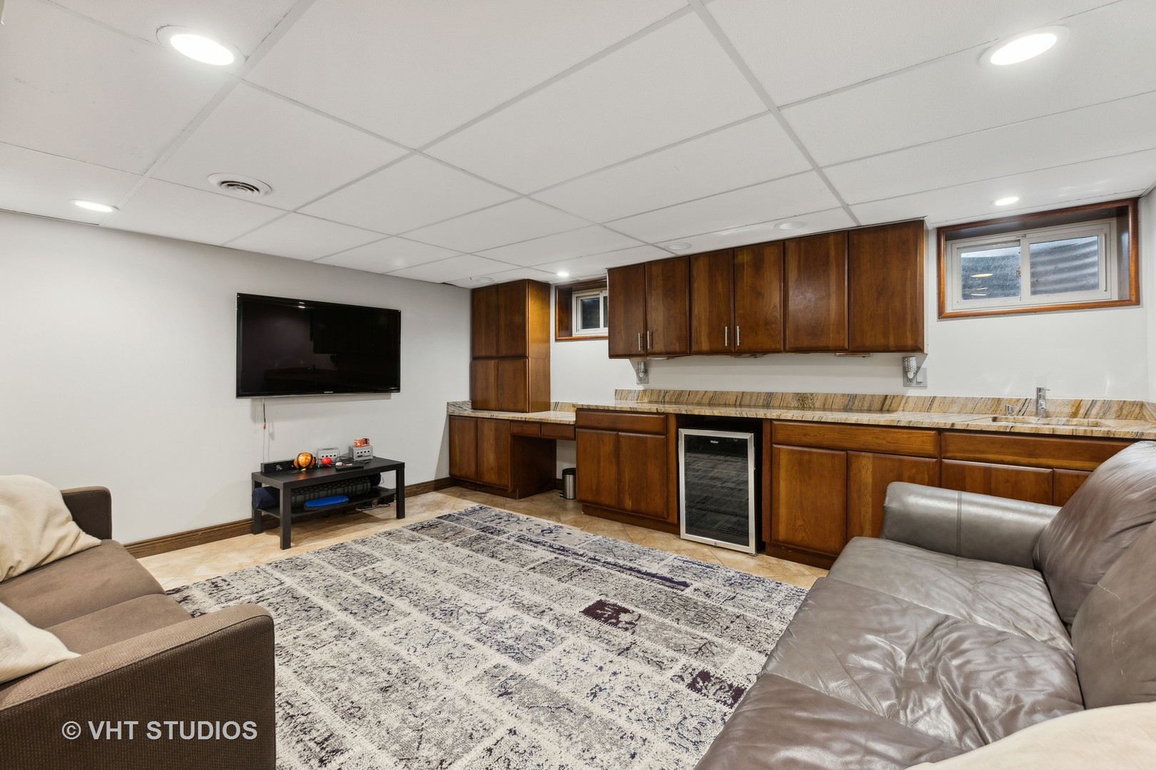 8521 Una Avenue Naperville, IL 60565 - Photo 25 of 41 a kitchen with stainless steel appliances granite countertop a stove refrigerator and microwave