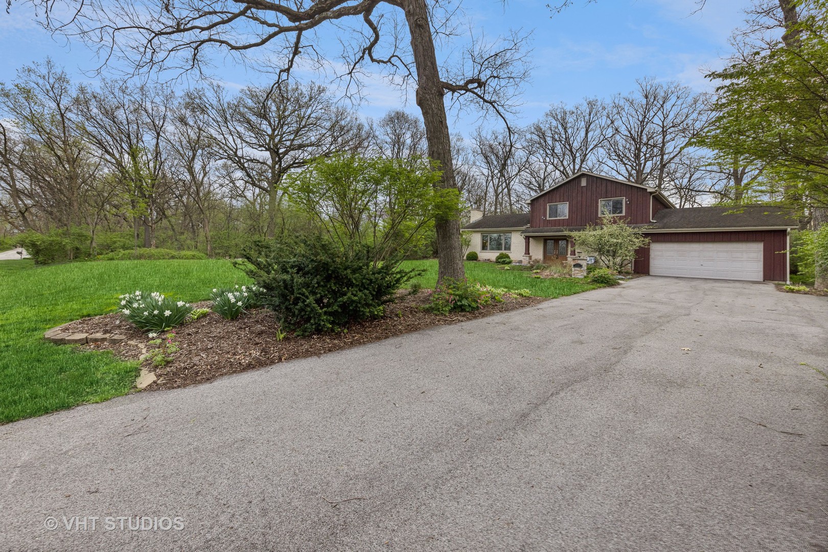 8521 Una Avenue Naperville, IL 60565 - Photo 4 of 41 a view of a house with a yard and large tree