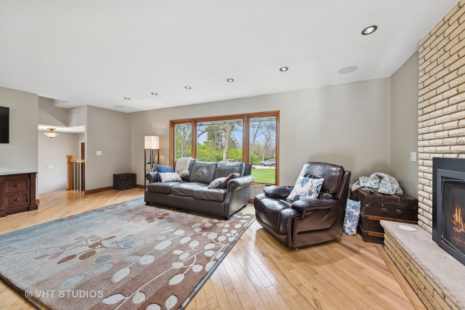 8521 Una Avenue Naperville, IL 60565 - Photo 10 of 41 a living room with furniture and a large window