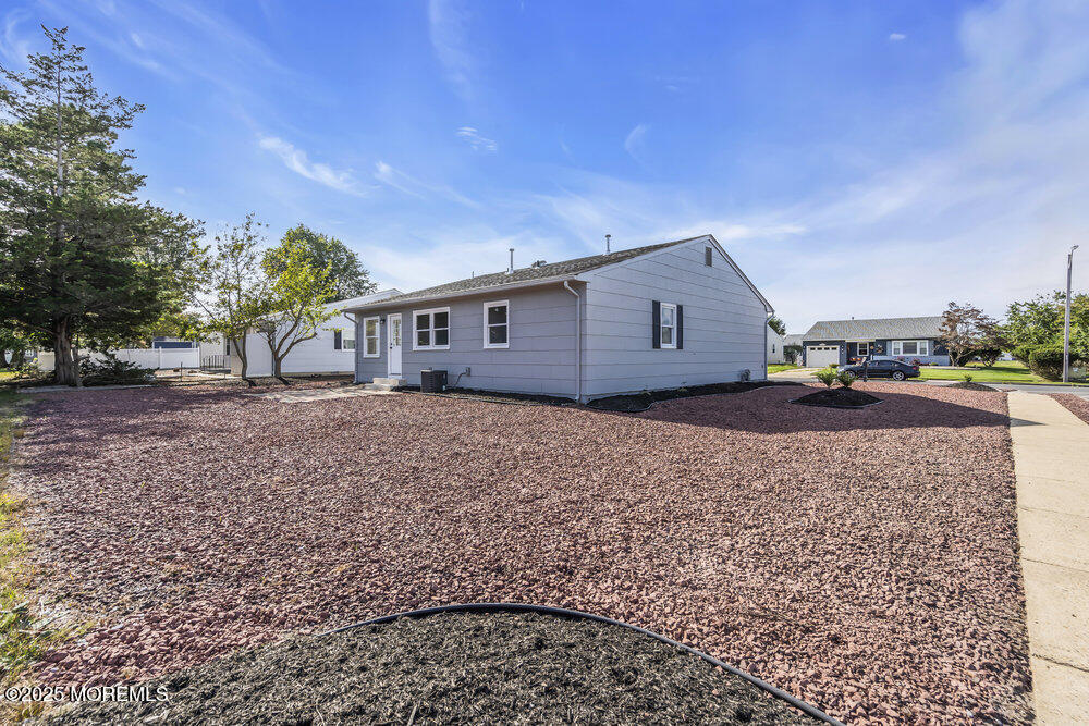 29 Carlisle Road Toms River, NJ 08757 - Photo 11 of 23 a house view with a backyard space