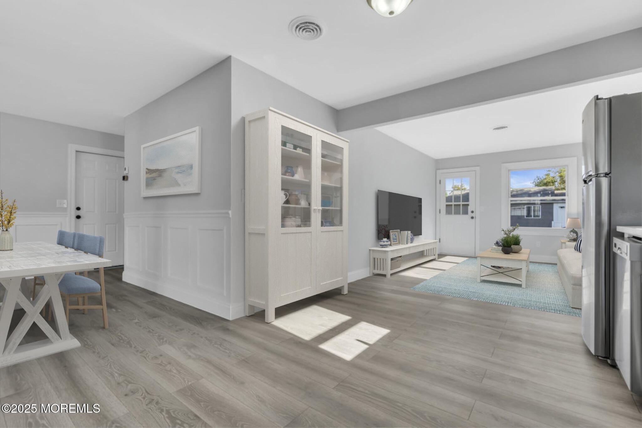 29 Carlisle Road Toms River, NJ 08757 - Photo 23 of 23 a living room with furniture and a flat screen tv