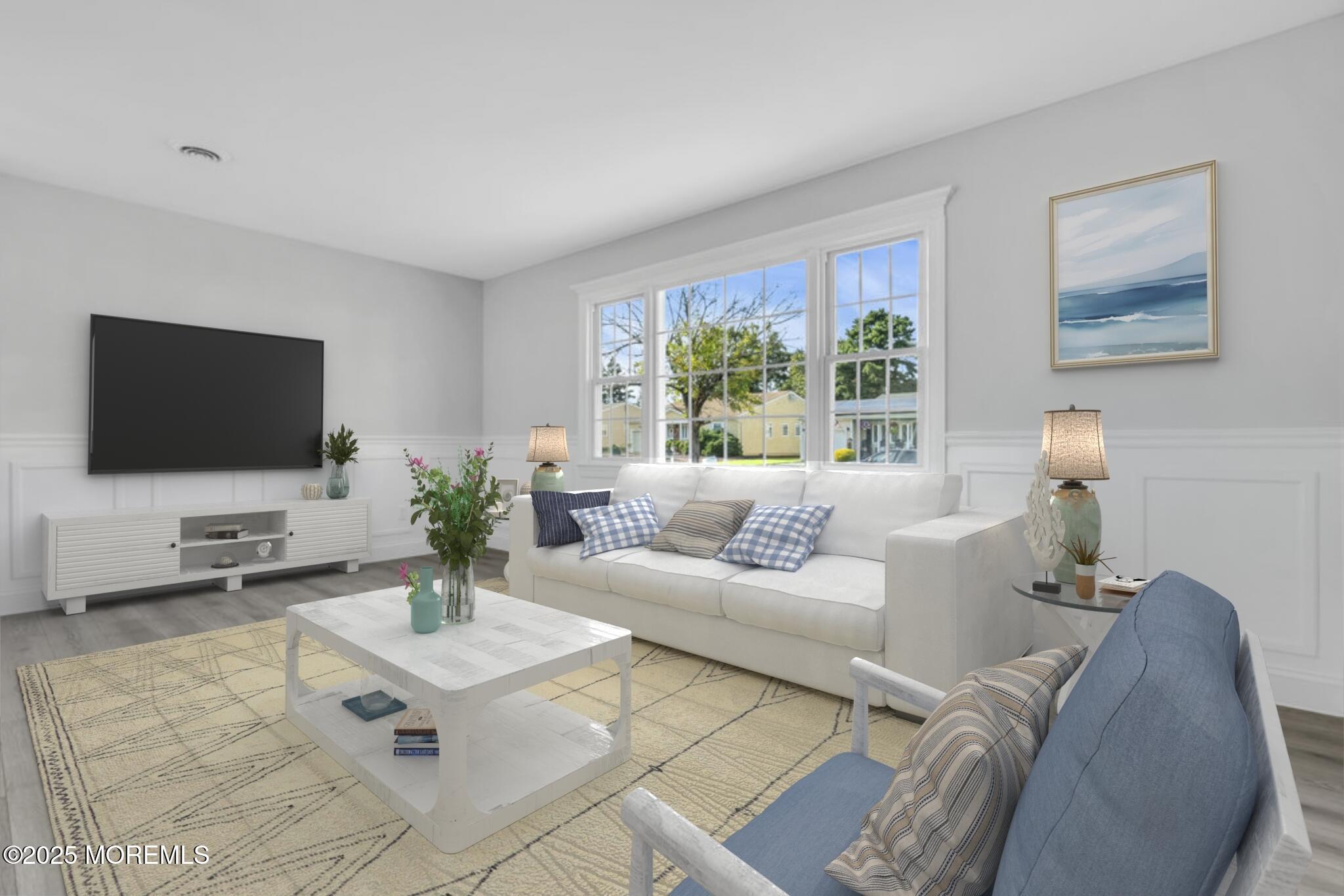 29 Carlisle Road Toms River, NJ 08757 - Photo 3 of 23 a living room with furniture a flat screen tv and a large window