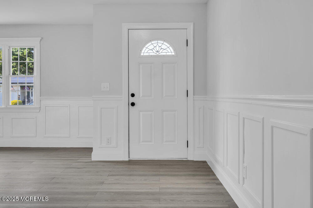 29 Carlisle Road Toms River, NJ 08757 - Photo 4 of 23 a view of an entryway with wooden floor
