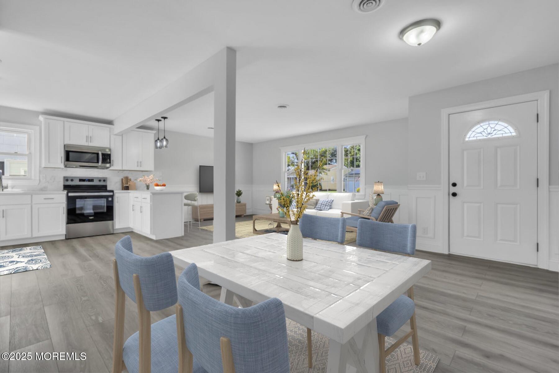 29 Carlisle Road Toms River, NJ 08757 - Photo 5 of 23 a view of a dining room with furniture and wooden floor