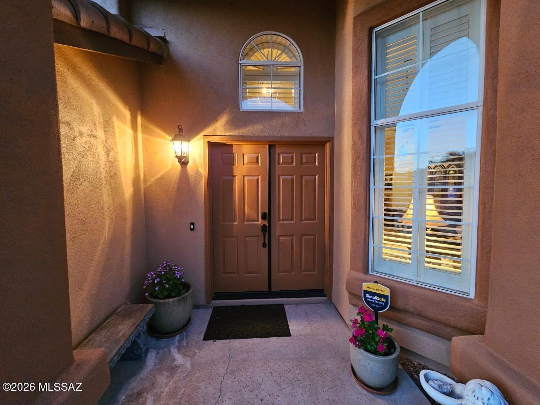 3130 West Star Ranch Trail Tucson, AZ 85742 - Photo 2 of 44 a front view of a house with chairs