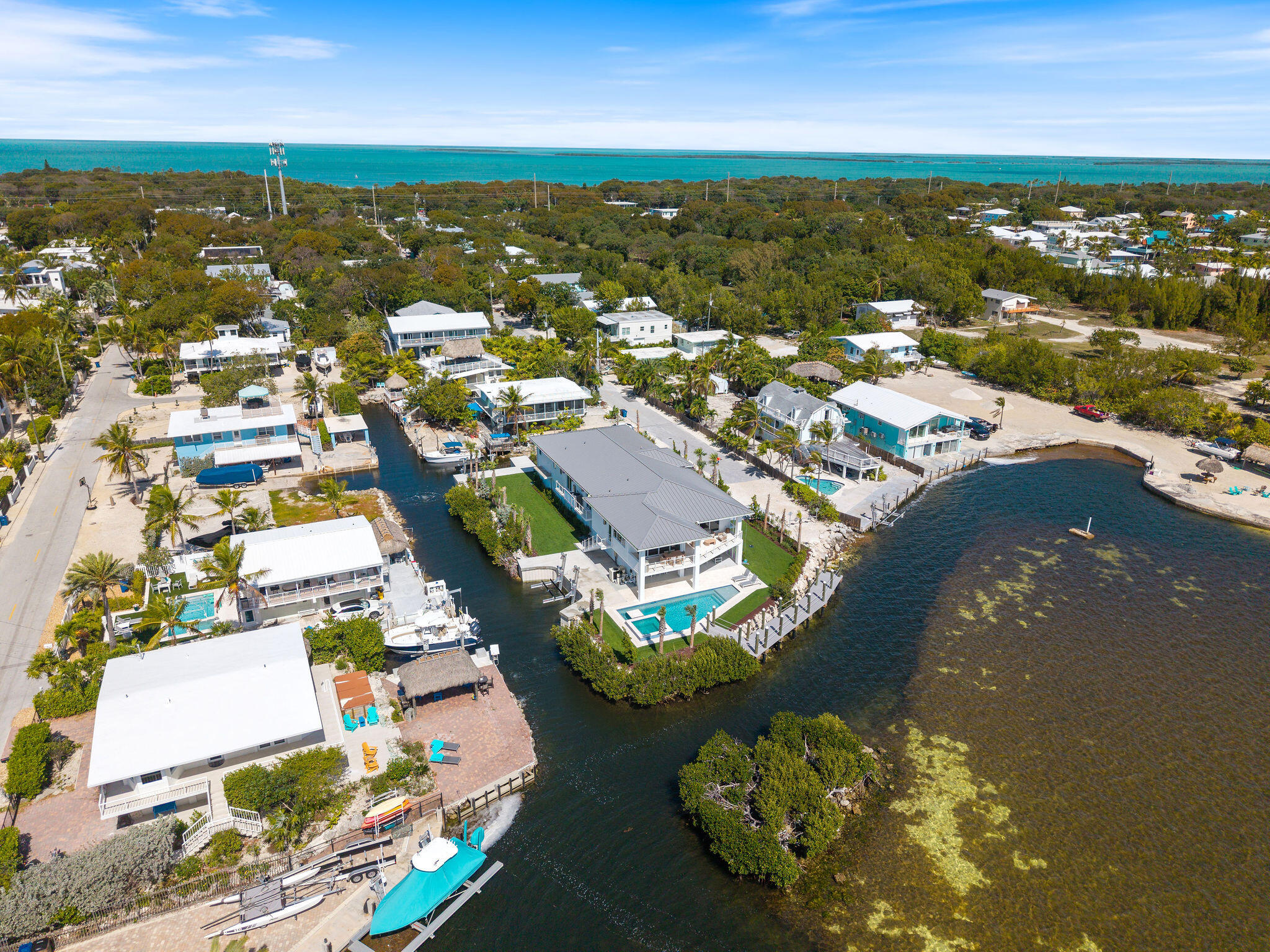 1002 Snapper Lane Key Largo, FL 33037 - Photo 97 of 106 an aerial view of residential houses with outdoor space