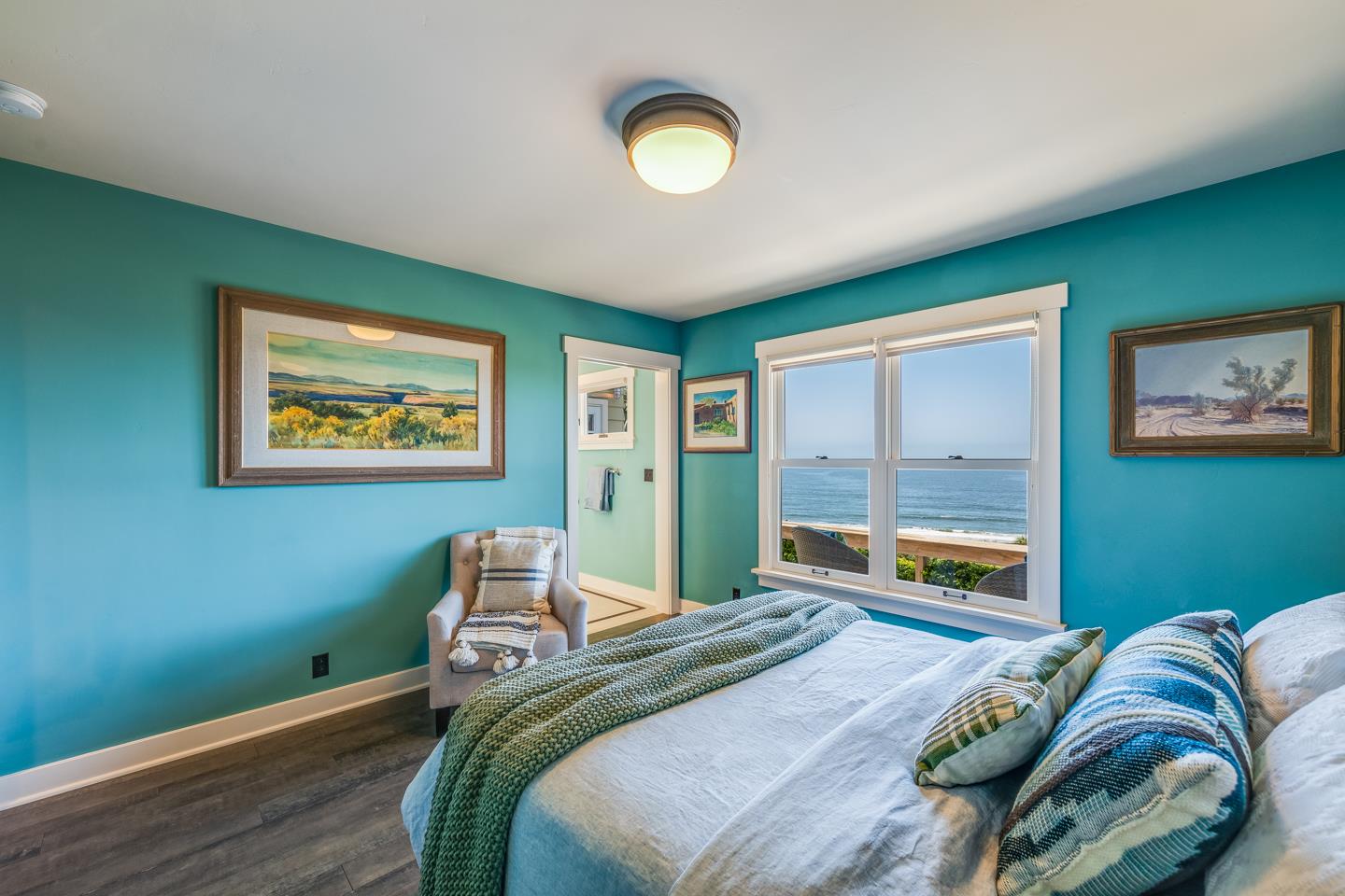 24 Cresta Way La Selva Beach, CA 95076 - Photo 16 of 23 a bedroom with a bed and a lamp on dresser with wooden floor