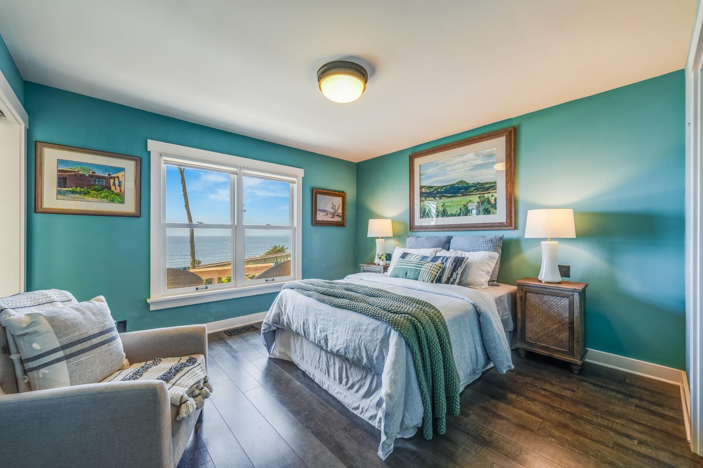 24 Cresta Way La Selva Beach, CA 95076 - Photo 17 of 23 a spacious bedroom with a bed and a couch