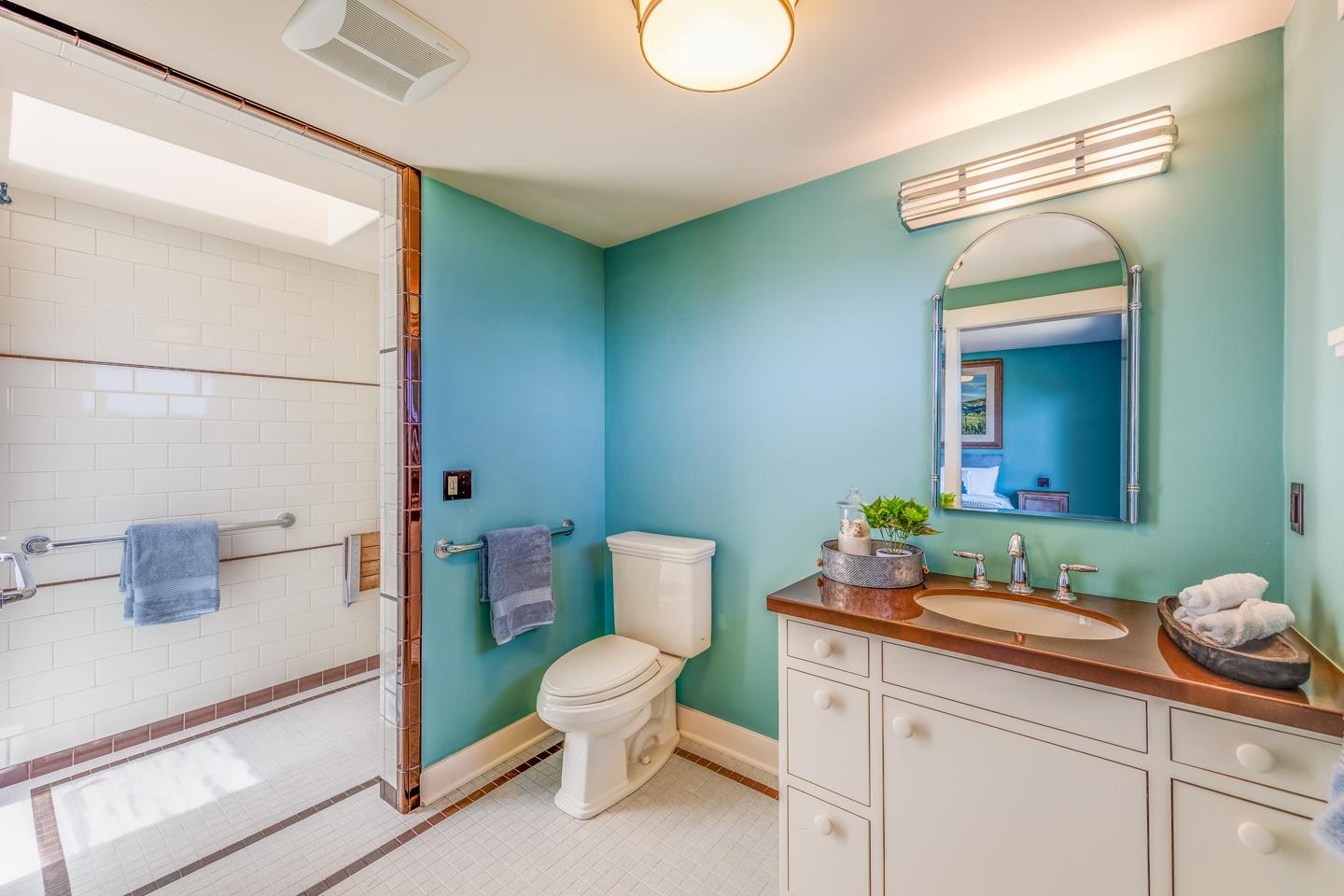 24 Cresta Way La Selva Beach, CA 95076 - Photo 18 of 23 a bathroom with a toilet sink and mirror