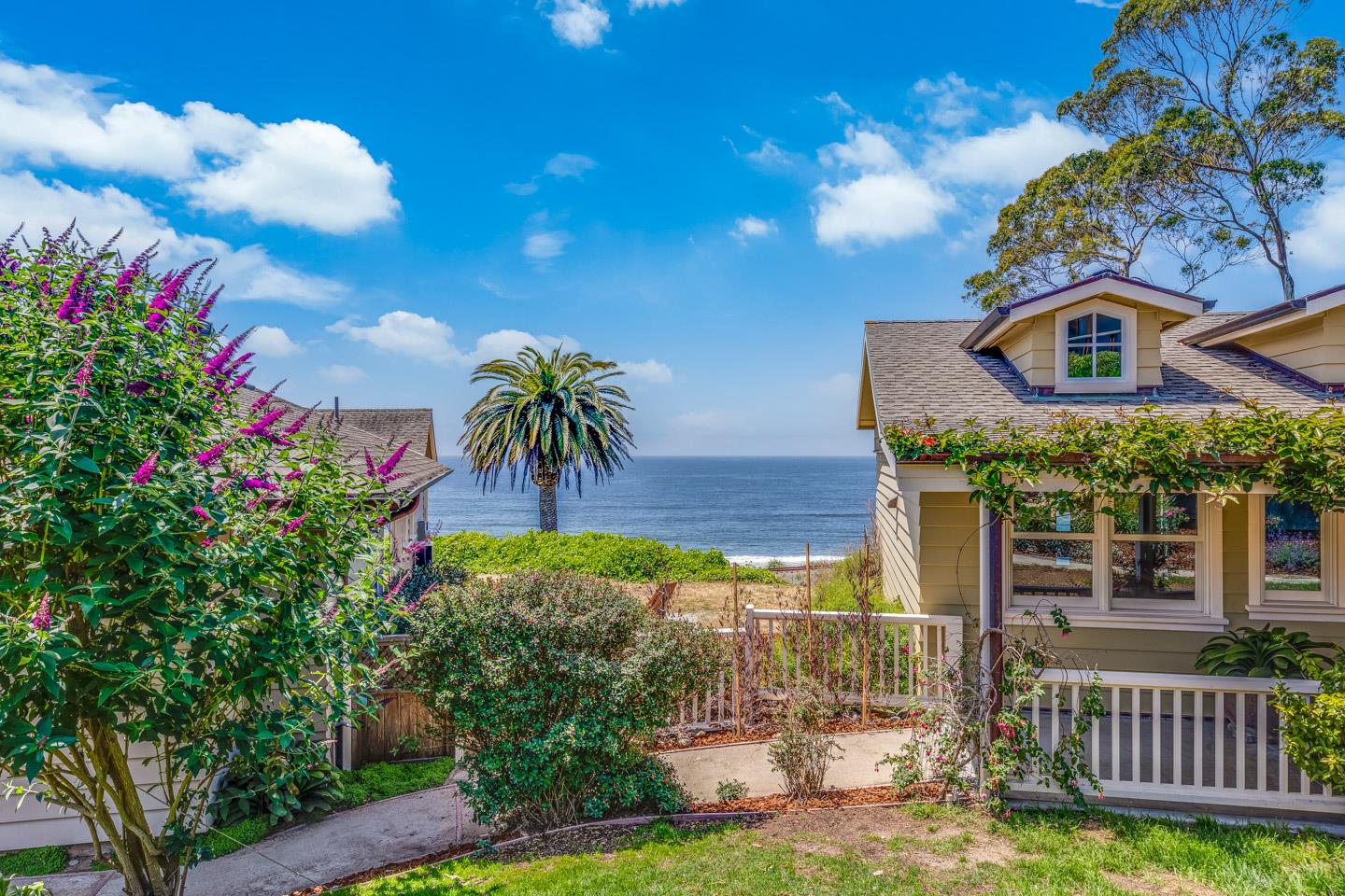 24 Cresta Way La Selva Beach, CA 95076 - Photo 2 of 23 a view of a house with a flower garden