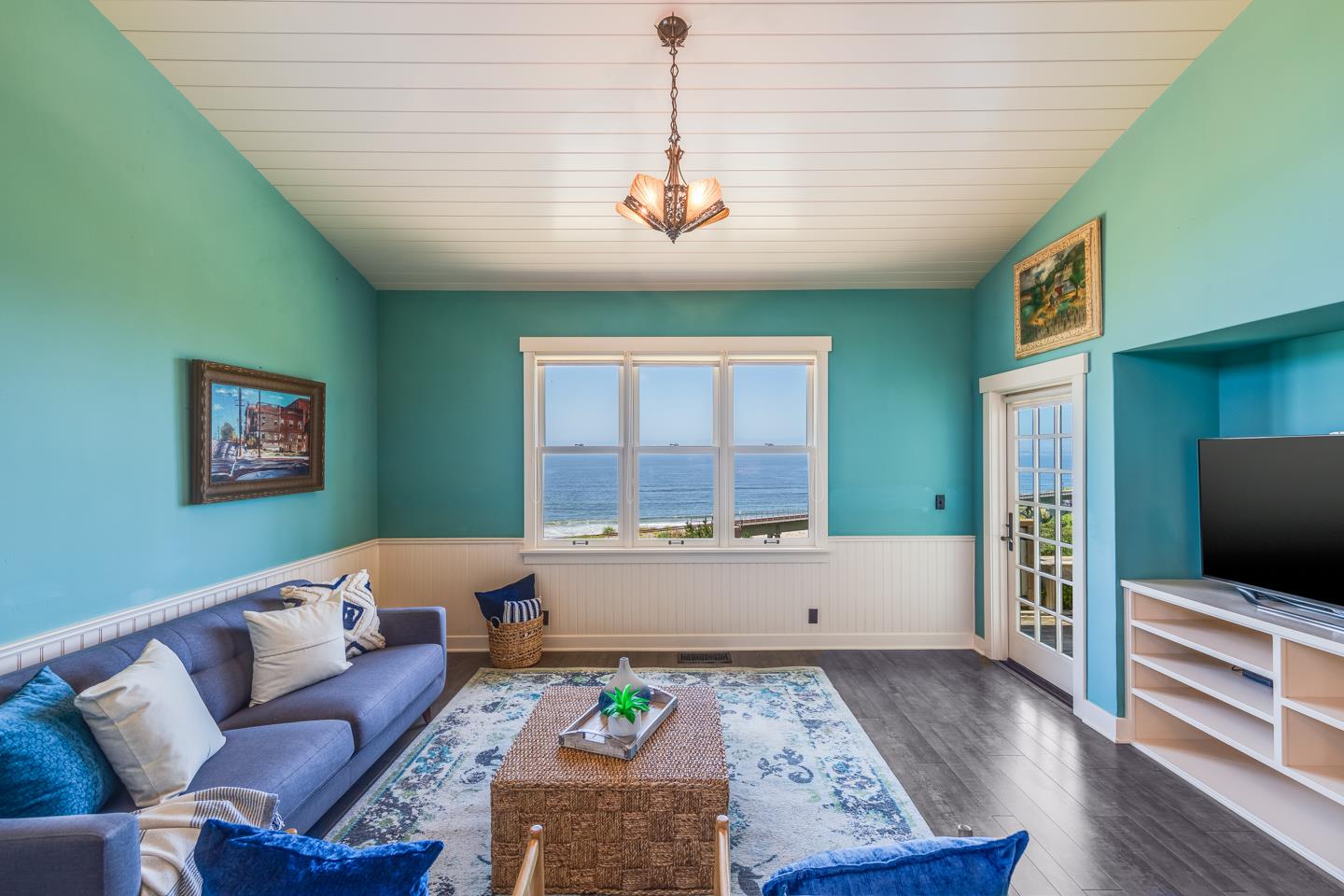 24 Cresta Way La Selva Beach, CA 95076 - Photo 9 of 23 a living room with furniture and a flat screen tv