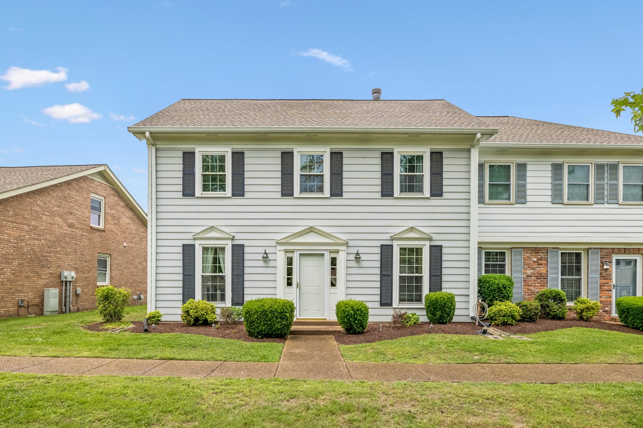 536 General George Patton Road Nashville, TN 37221 - Photo 4 of 39 a front view of a house with garden and porch