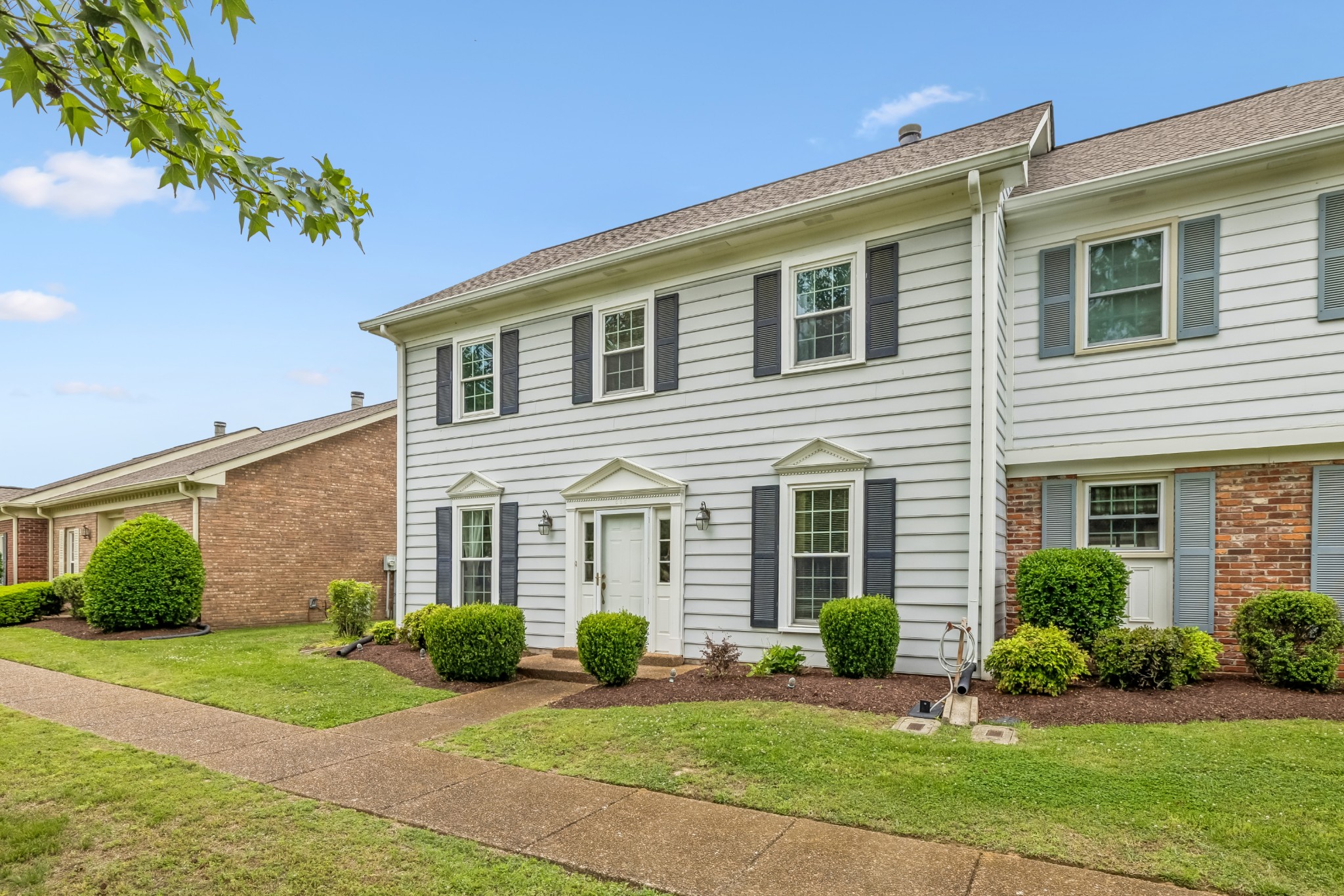 536 General George Patton Road Nashville, TN 37221 - Photo 5 of 39 a front view of a house with garden and porch