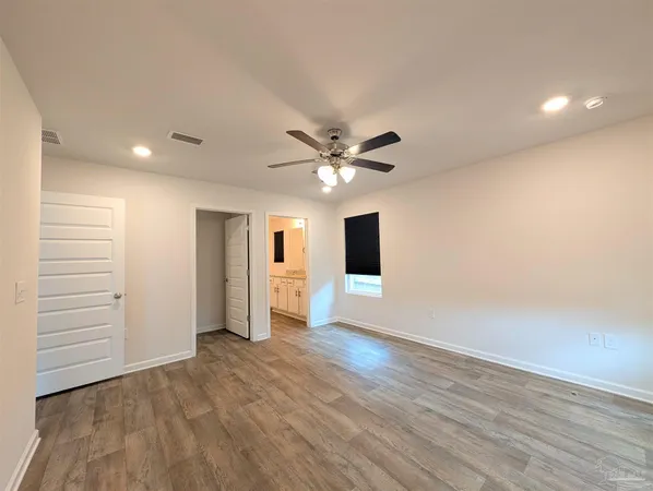 a view of a livingroom with a ceiling fan