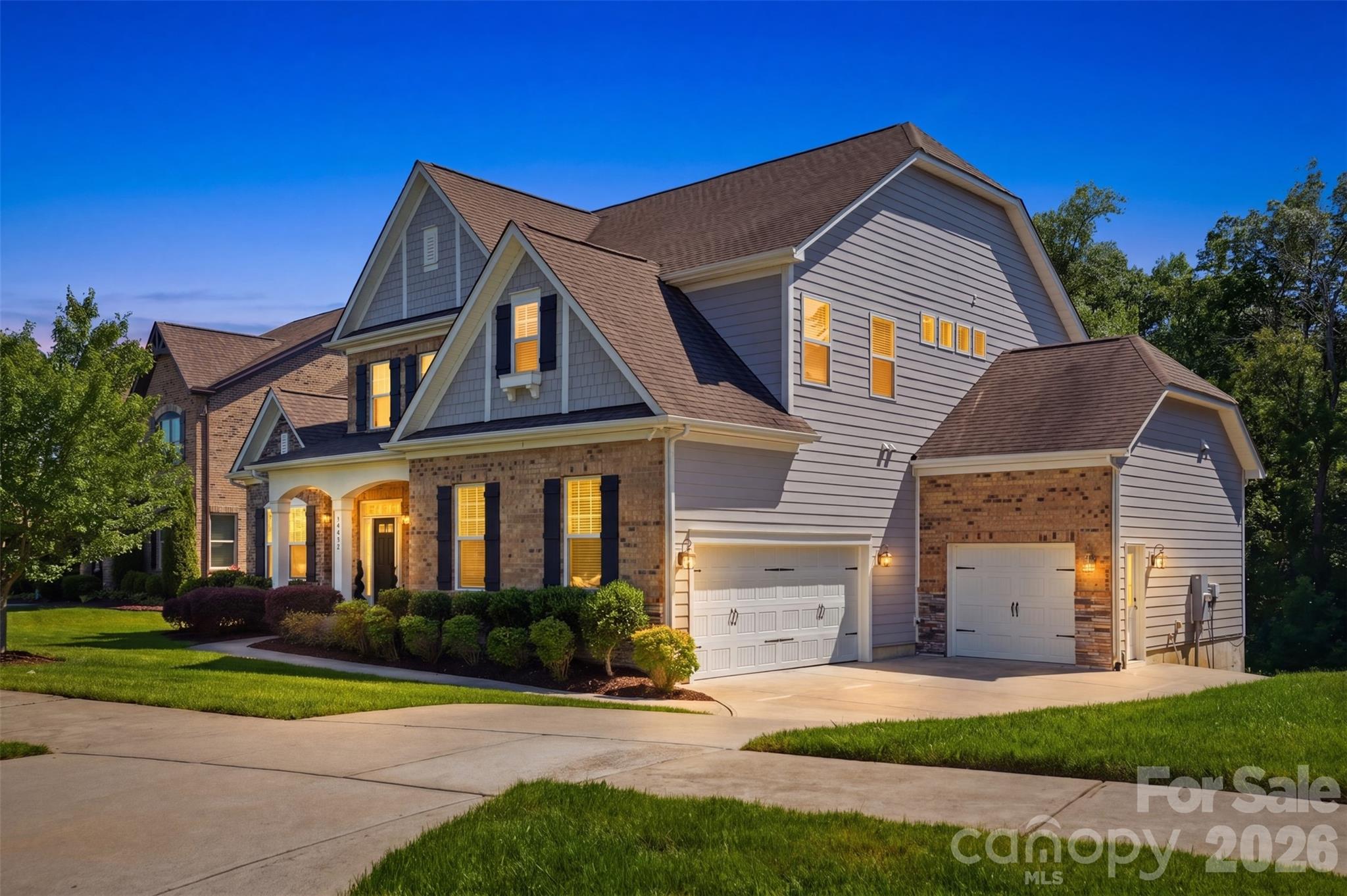 14022 Salem Ridge Road Huntersville, NC 28078 - Photo 1 of 38 a front view of a house with a yard and garage