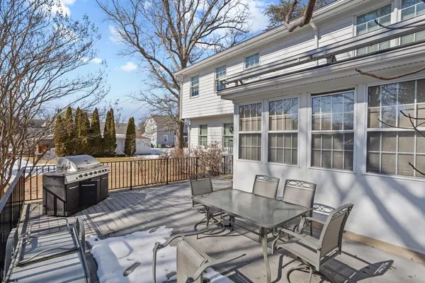 a view of a patio with couches table and chairs